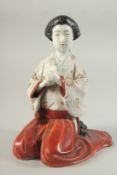 A JAPANESE PORCELAIN IMARI BIJIN, 25cm high.