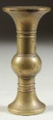 A SMALL CHINESE BRASS GU SHAPE VASE, 10cm high.