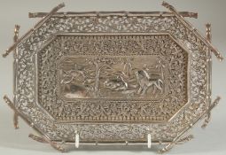 A VERY FINE 19TH CENTURY INDIAN KUTCH SILVER TRAY, with a panel of embossed and chased animals,