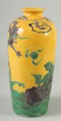 A CHINESE YELLOW GROUND FAHUA-TYPE POTTERY VASE, with raised decoration of dragon, kylin, and