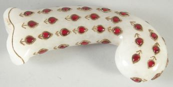 AN INDIAN HARDSTONE DAGGER HANDLE, 14cm long.