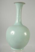 A CHINESE CELADON GLAZE PORCELAIN VASE, 28cm high.