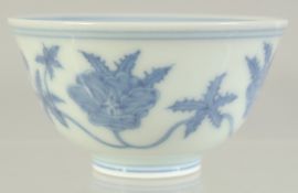A CHINESE BLUE AND WHITE PORCELAIN CUP, with flora, character mark to base, 8cm diameter.