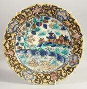 A RARE AND UNUSUAL PERSIAN CHINESE MARKET GLAZED POTTERY DISH, 30cm diameter.