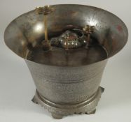 A CHINESE TINNED COPPER TABLETOP WATER FOUNTAIN, 20cm high, 30cm diameter.