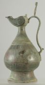 A RARE 12TH-13TH CENTURY PERSIAN SELJUK COPPER INLAID BRONZE EWER, 24.5cm high.