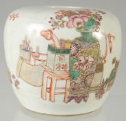 A CHINESE QING DYNASTY FAMILLE ROSE PORCELAIN WATER POT. painted with a vase of flowers and other