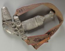 A GOOD MIDDLE EASTERN JAMBIYA DAGGER, with embossed silver overlaid scabbard, overall length 33cm.