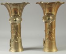A PAIR OF JAPANESE PETAL FORMED BRASS VASES, with relief floral decoration, both with impressed mark