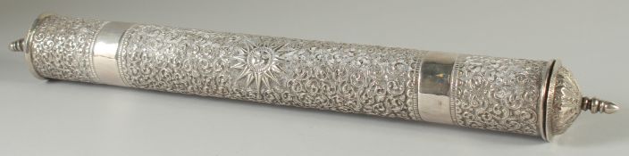 A FINE LARGE ISLAMIC EMBOSSED AND CHASED SILVER SCROLL CASE, with a pair of plain bands and sunburst