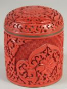 A CHINESE CINNABAR LACQUER CYLINDRICAL BOX AND COVER, 9.5cm high.
