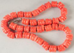 A CORAL NECKLACE. 18ins long.
