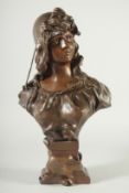 A. NELSON. A GOOD BRONZE BUST OF GARDEUSE J'OUS. Signed, H. Luppers & Co. Editeurs. 19ins high.