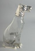 A GOOD SILVER PLATED GLASS DOG CLARET JUG. 9ins high.