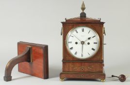 A GOOD REGENCY MAHOGANY BRASS INLAID BRACKET CLOCK by HOLMDEN, LONDON with enamel dial, strike/