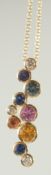 AN 18CT YELLOW GOLD AND MULTI COLOURED SAPPHIRE PENDANT AND CHAIN.