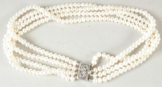 A FOUR ROW CULTURED PEARL NECKLACE.