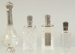 FOUR GOOD 19TH CENTURY FRENCH SILVER MOUNTED GLASS SCENT BOTTLES.