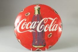 A CIRCULAR ENAMEL SIGN 'COCA COLA'. 11.5ins diameter.