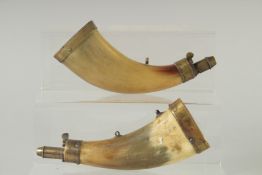 TWO BRASS MOUNTED HORN POWDER FLASKS. 8ins long.