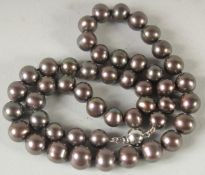 A THITAIN BLACK CULTURED PEARL NECKLACE.