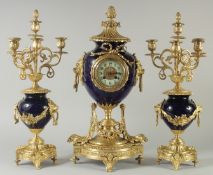 A SUPERB 19TH CENTURY SEVRES BLUE THREE PIECE CLOCK SET with ormolu mounts, the side panels with