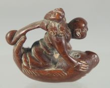 A CARVED WOOD MONKEY NETSUKE. 4cm.
