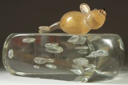 A NOVELTY GLASS CHEESE with a mouse. 8ins long.