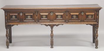 A VERY GOOD 18TH CENTURY OAK LONG DRESSER BASE, good colour, with three cushion shaped drawers,