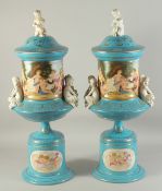 A LARGE PAIR OF SEVRES DESIGN BLUE AND WHITE VASES, BASES AND LIDS, moulded with white porcelain