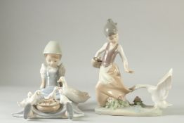 A LLADRO PORCELAIN GROUP OF A GIRL FEEDING DUCKS and another GIRL BEING ATTACKED BY A SWAN (2).