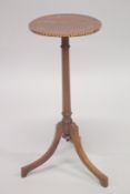 A 19TH CENTURY MAHOGANY INLAID CIRCULAR TOP TABLE. 10ins diameter, 2ft 2ins long.