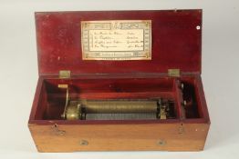 A GOOD SWISS MUSICAL BOX in a plain case, FABRIQUE DE GENEVA, QUATRE AIRS, No. 1303. Case 15ins