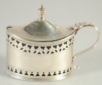 A GEORGE III SILVER OVAL MUSTARD POT AND COVER by HESTER BATEMAN with sapphire blue liner. London