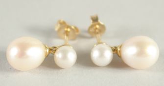 A PAIR OF 9CT GOLD AND DOUBLE PEARL DROP EARRINGS.