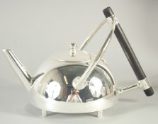 A CHRISTOPHER DRESSER DESIGN SILVER PLATED CIRCULAR SHAPE TEA POT.