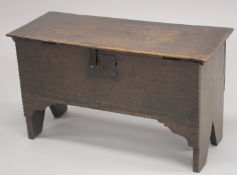 AN 18TH CENTURY OAK COFFER with plain plank construction. 2ft 3ins wide, 11ins deep, 1ft 3ins high.