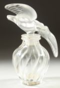 A LALIQUE GLASS SCENT BOTTLE the stopper as two birds. 4ins high.