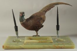 A SUPERB ONYX AND COLD CAST BRONZE INKSTAND with two pen holders and a cold cast bronze of a