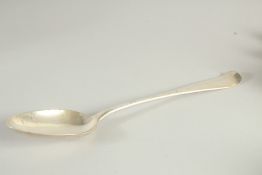 A VICTORIAN SILVER RAT TAIL BASTING SPOON. London 1894. Maker, C. B.