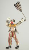 A STERLING SILVER AND ENAMEL DECORATED MODEL OF A CLOWN.