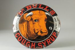 A CIRCULAR ENAMEL SIGN 'BULL'S COUGH SYRUP'. 11.5ins diameter.