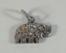 A SMALL DIAMOND ELEPHANT PENDANT.