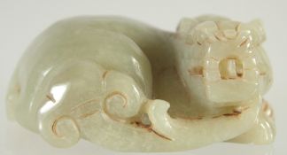 A CHINESE CARVED JADE FOO DOG. 2.5ins.