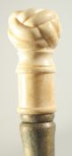 A WALKING STICK with carved bone handle, 'KNOT'.