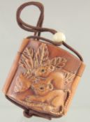 A WOODEN INRO AND ROPE WITH RABBITS. 2ins.