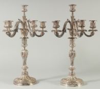 A SUPERB PAIR OF CHRISTOPHEL FIVE BRANCH CANDLESTICKS on circular bases. 18ins high.