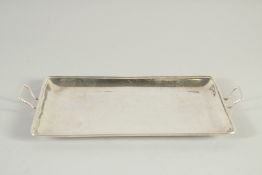 A GEORGE III SILVER TWO HANDLED TRAY. 9.5ins long. London 1782. Maker JAMES SUTTON & JOE BULT.