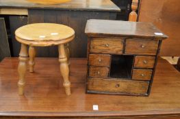 A small elm stool and an oak table top chest.