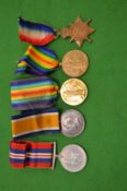 Five various WWI and WWII medals.